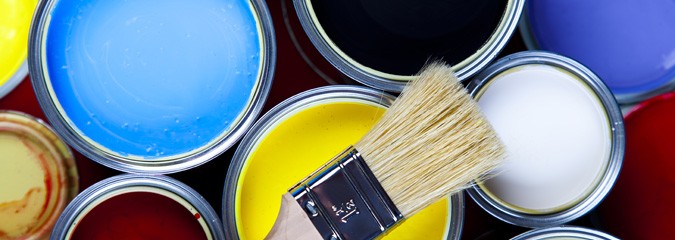 Pots of paint and a brush
